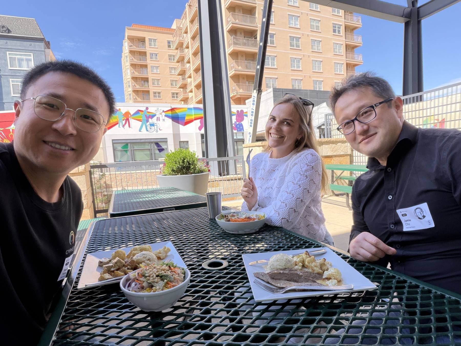 Carmen Kivisild at lunch with the Cypher team on an outdoor terrace in Salt Lake City.