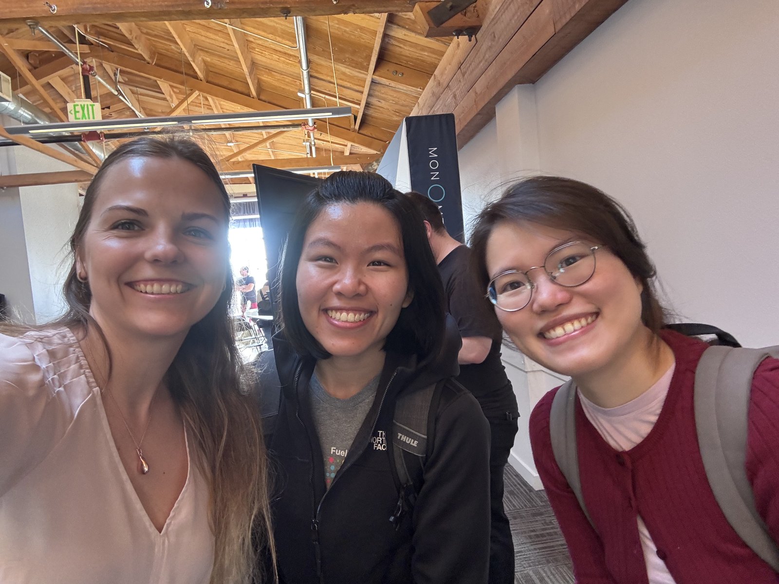 Carmen Kivisild with two participants at the Cell Culture Hackathon.